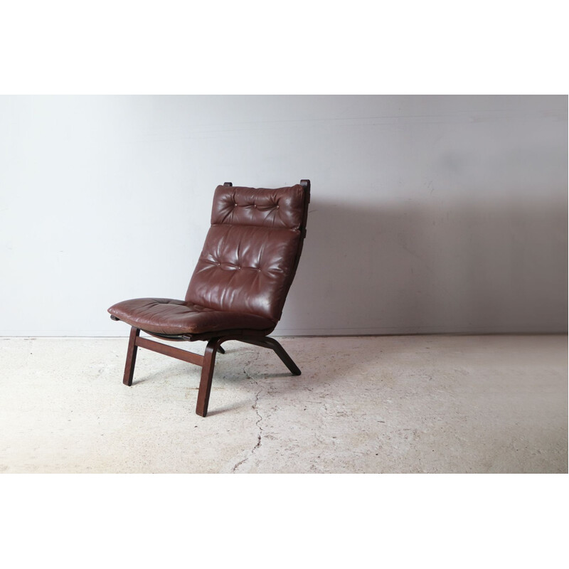 Vintage danish brown leather lounge chair in beechwood 1970