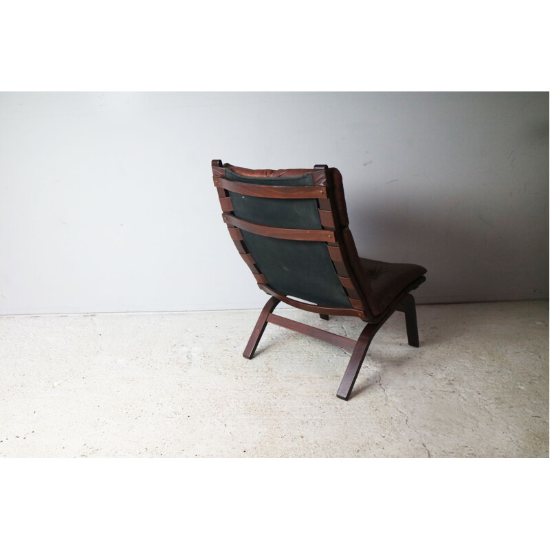 Vintage danish brown leather lounge chair in beechwood 1970