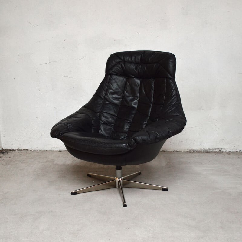 Fauteuil vintage coque lounge en cuir noir