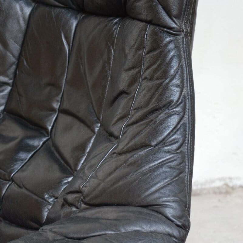 Fauteuil vintage coque lounge en cuir noir
