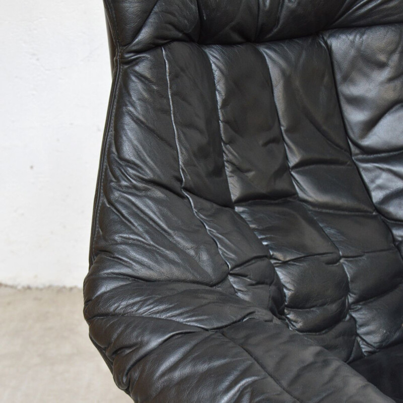 Vintage armcahirs in black leather