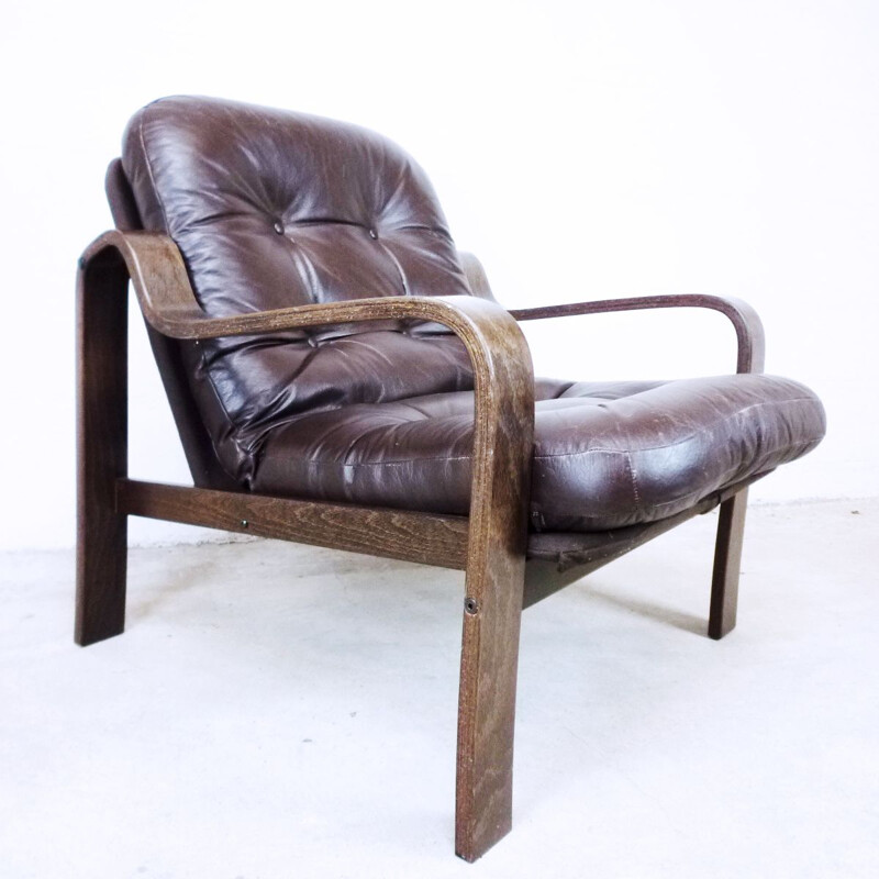 Vintage Scandinavian armchair in brown leather