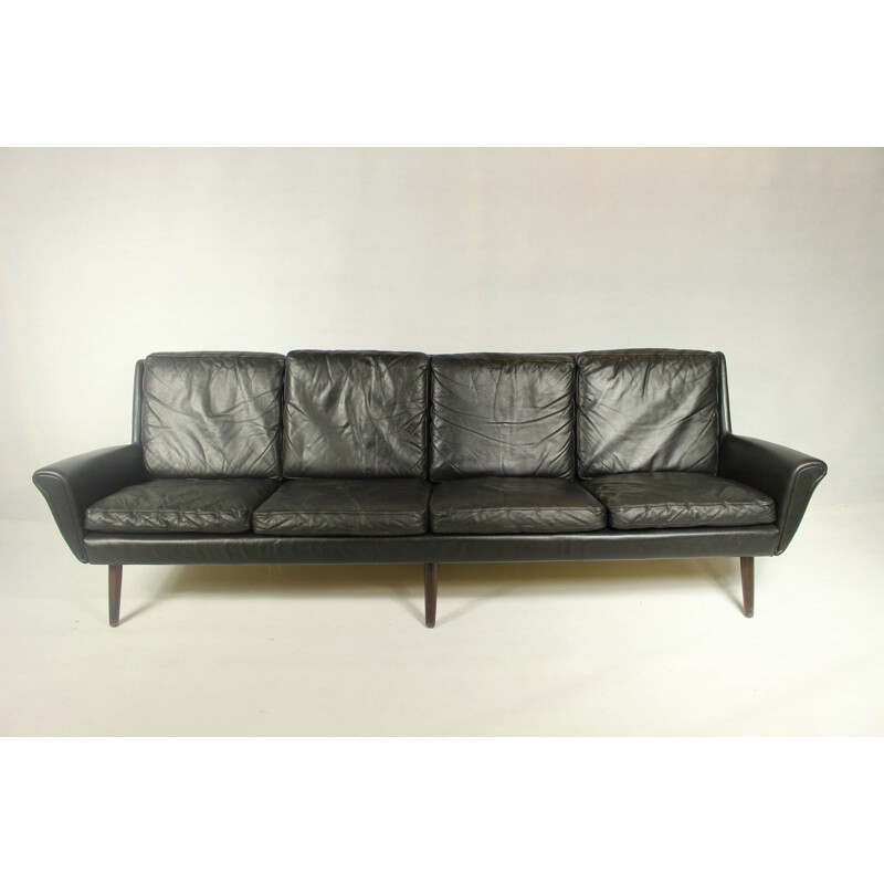 Vintage 4-seater sofa in black leather