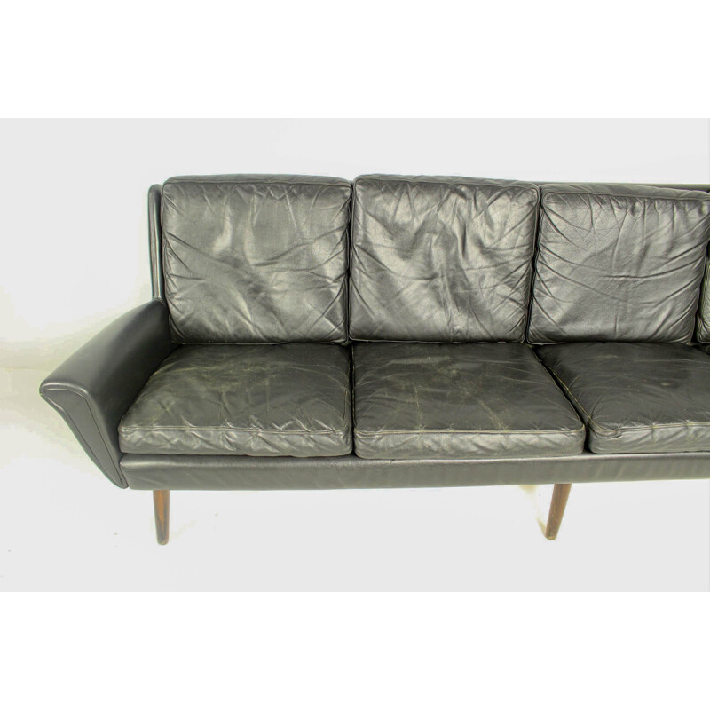 Vintage 4-seater sofa in black leather