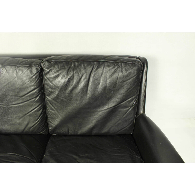 Vintage 4-seater sofa in black leather