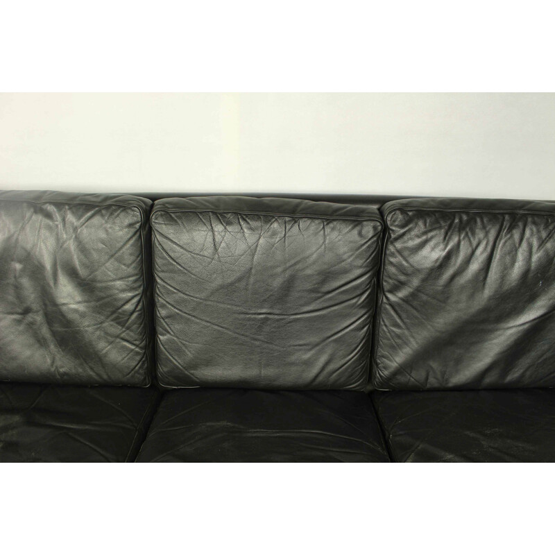 Vintage 4-seater sofa in black leather