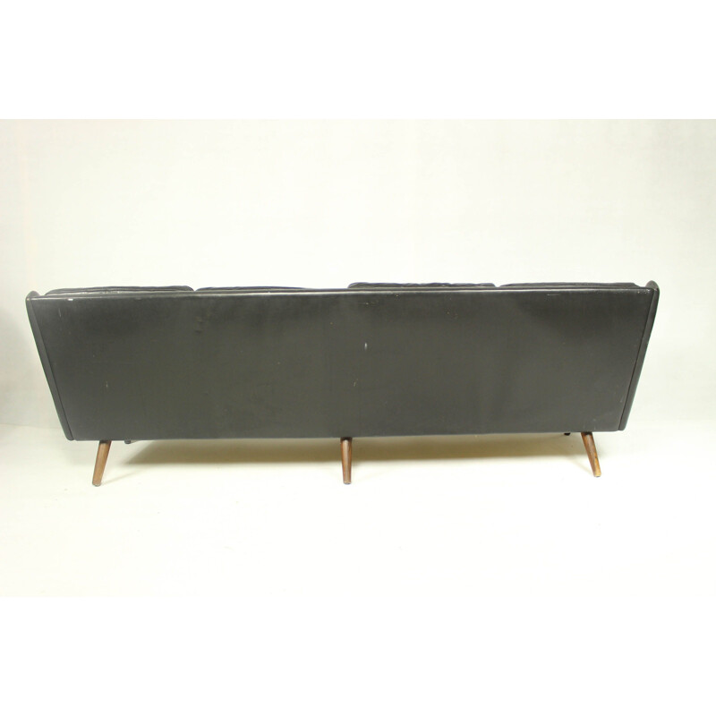 Vintage 4-seater sofa in black leather