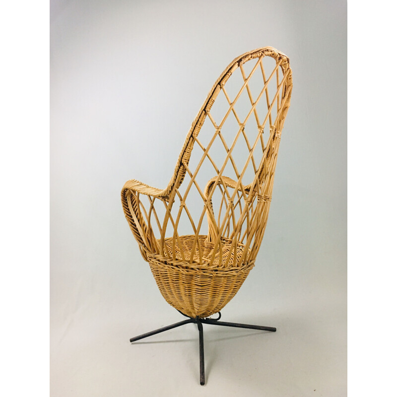 Vintage French "egg" armchair in steel and rattan