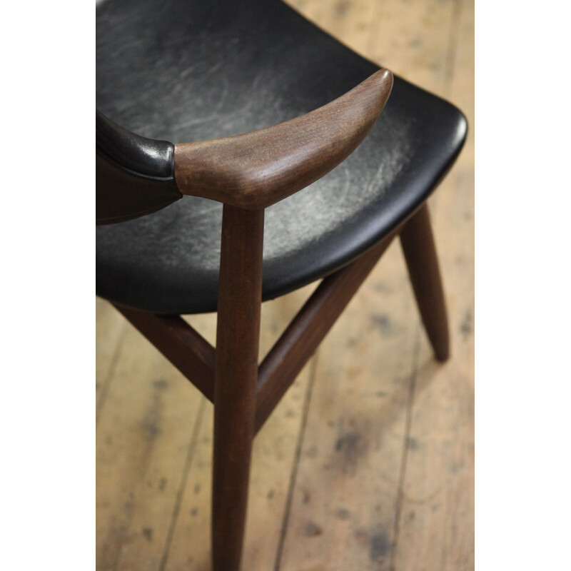 Vintage black chair in teak by Tijsseling 