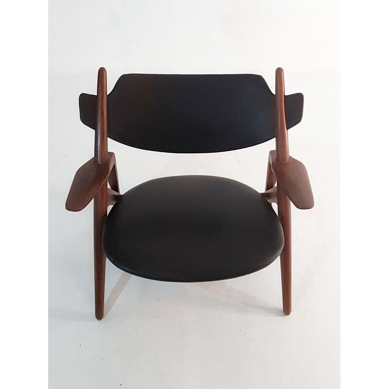 Vintage teak and leatherette chair by Hans Wegner