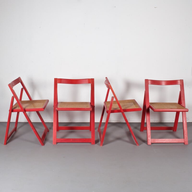 Set of 4 vintage red folding cane chairs 1980s