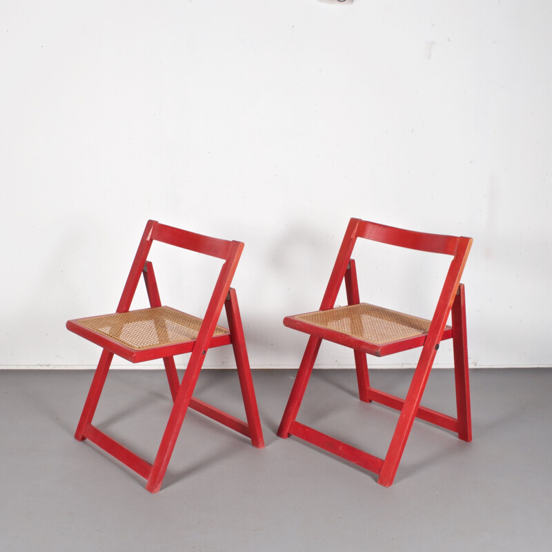 Set of 4 vintage red folding cane chairs 1980s