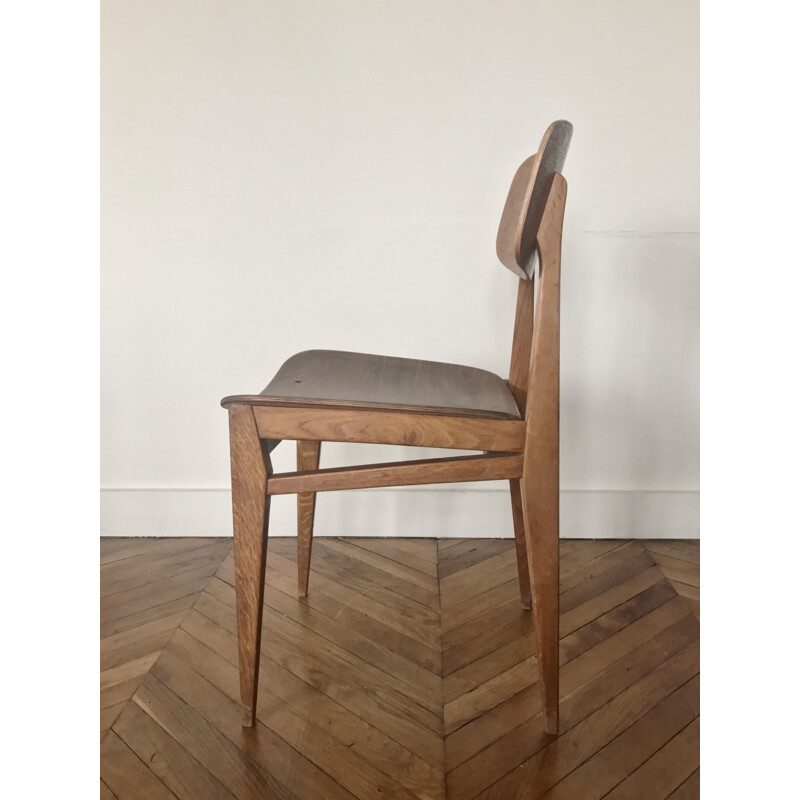 French vintage chair by Etienne Henri Martin in wood 1950