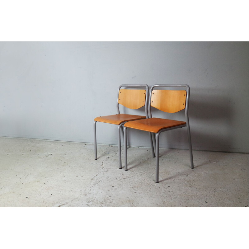 Set of 4 vintage Danish industrial stacking chairs