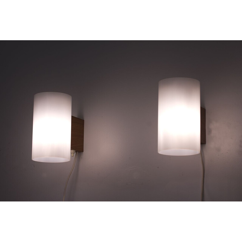 Pair of white wall lights in plastic and oak