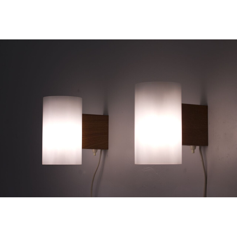 Pair of white wall lights in plastic and oak