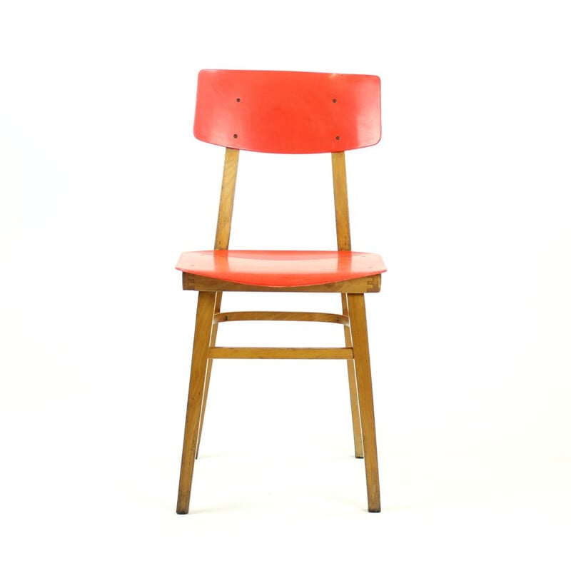 Vintage red chair in plastic and beechwood