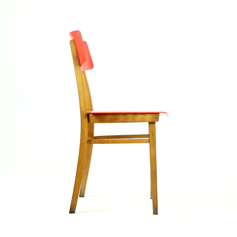 Vintage red chair in plastic and beechwood