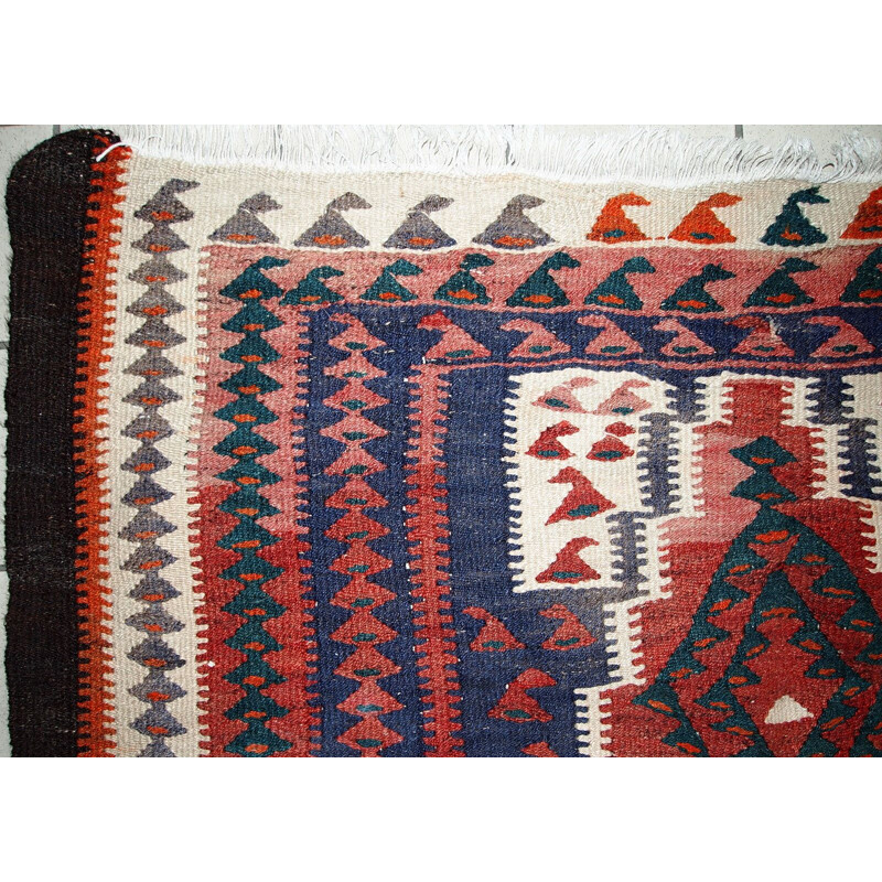Vintage handmade carpet in wool