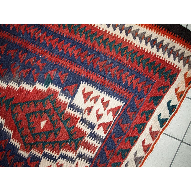 Vintage handmade carpet in wool