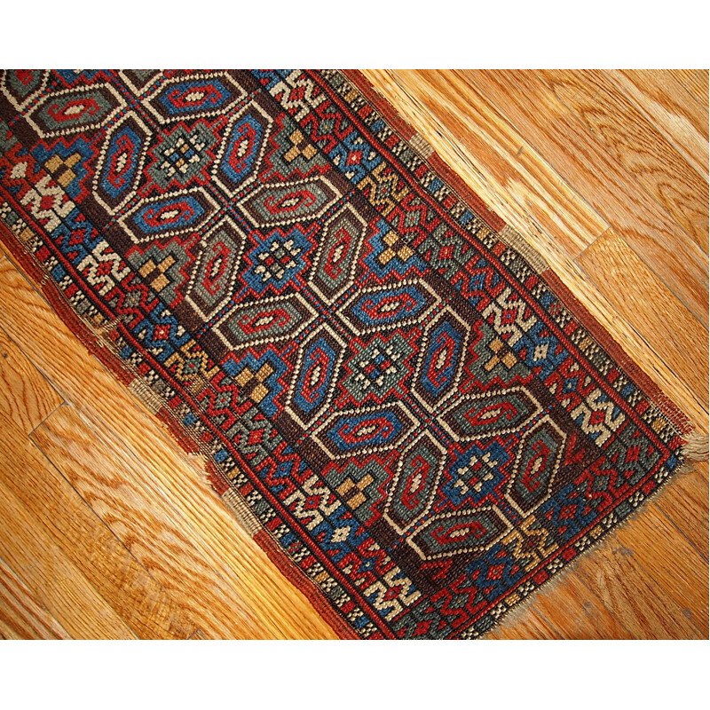 Red antique rug in wool