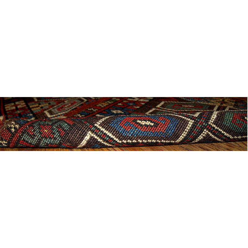 Red antique rug in wool