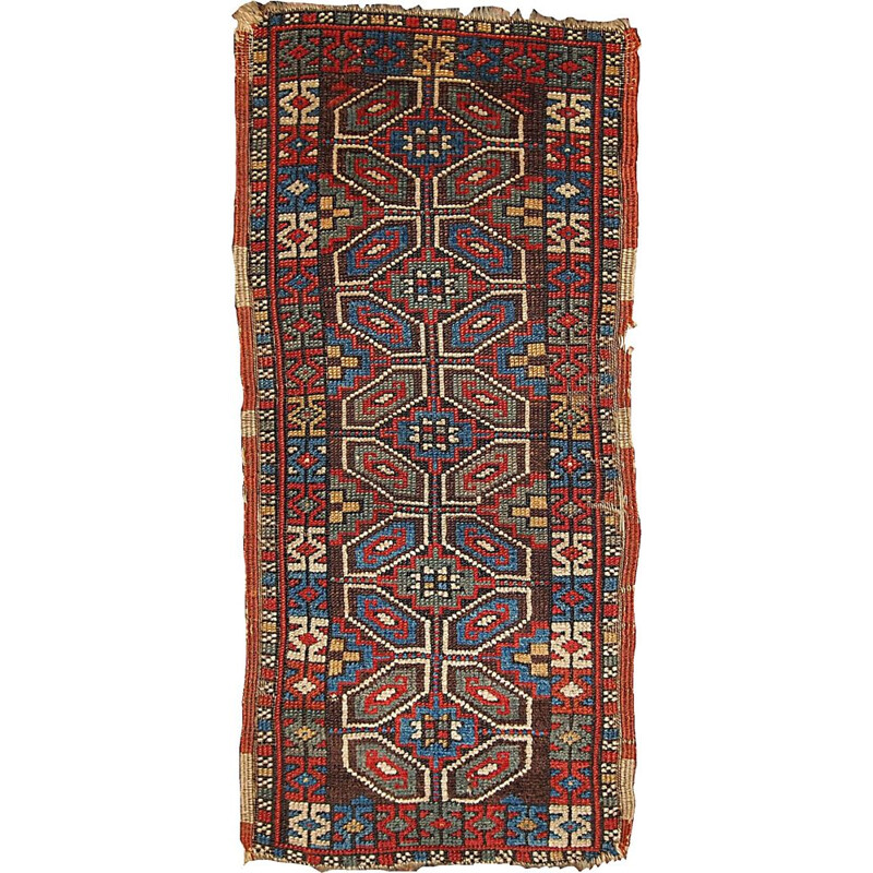 Red antique rug in wool