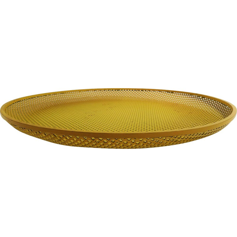 Vintage yellow tray in perforated metal