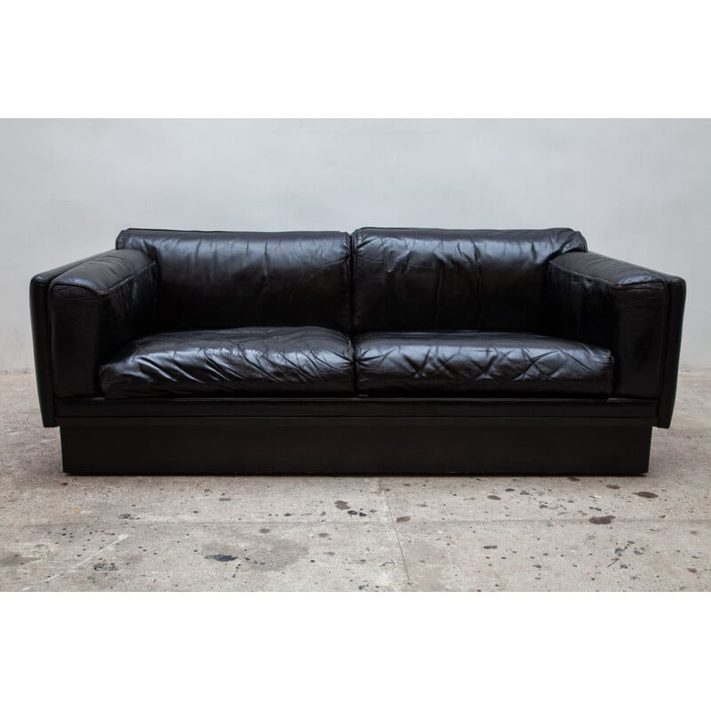 Vintage sofa in metal and black leather