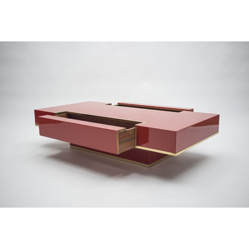 Red coffee table in brass by Jean-Claude Mahey