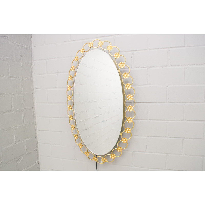 Illuminated vintage oval mirror with gold metal rings