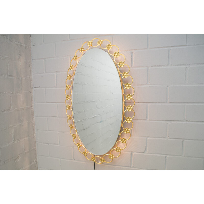 Illuminated vintage oval mirror with gold metal rings