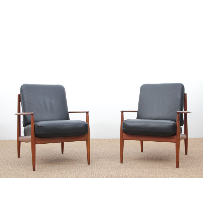 Set of 2 vintage Scandinavian teak armchairs