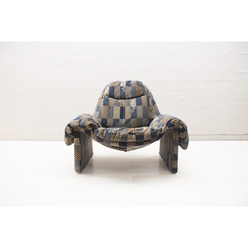 Vintage armchair and ottoman by Vittorio Introini