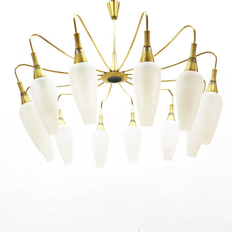 Vintage chandelier in brass and white glass