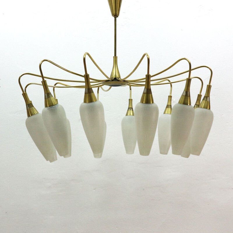 Vintage chandelier in brass and white glass