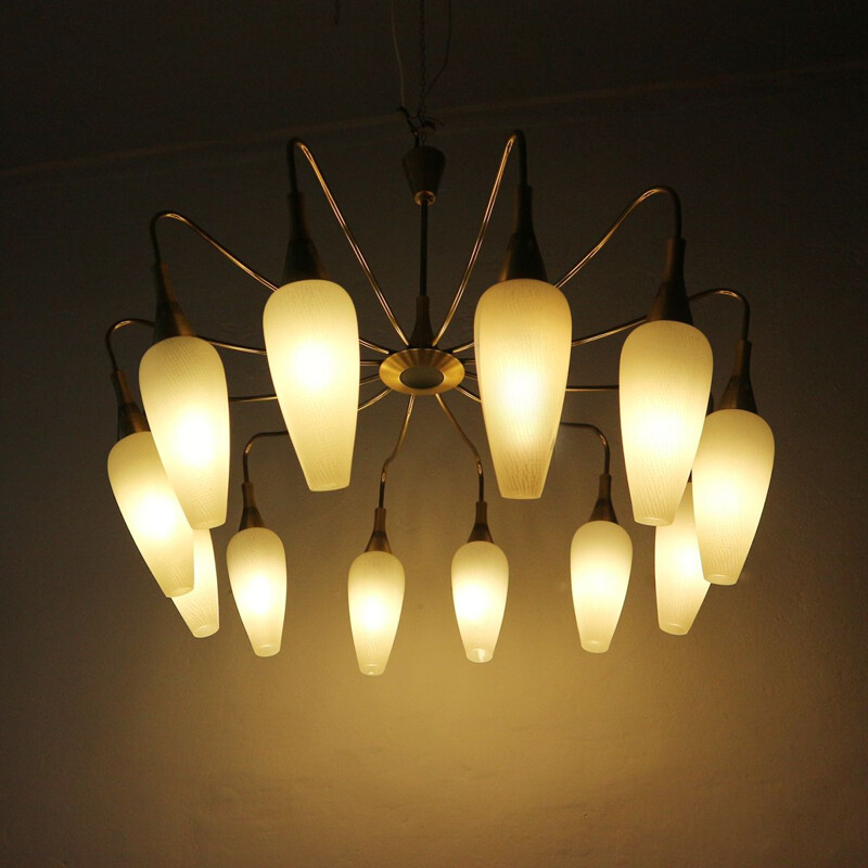 Vintage chandelier in brass and white glass