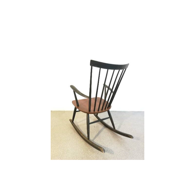 Vintage rocking chair by Roland Rainer