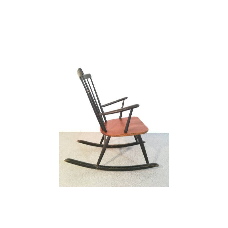 Vintage rocking chair by Roland Rainer