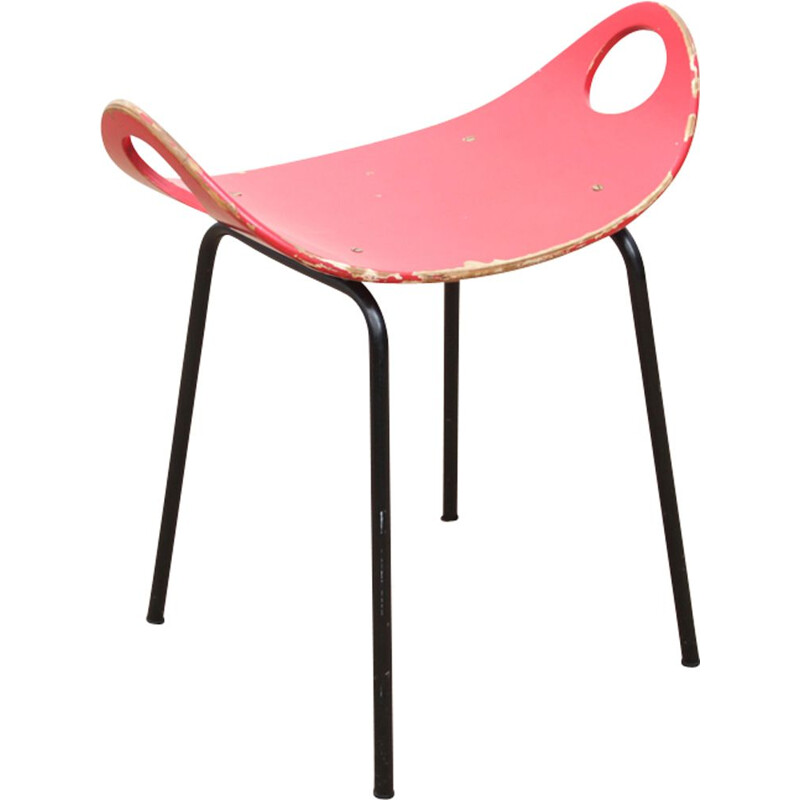 Red stool in steel by Olof Kettunen