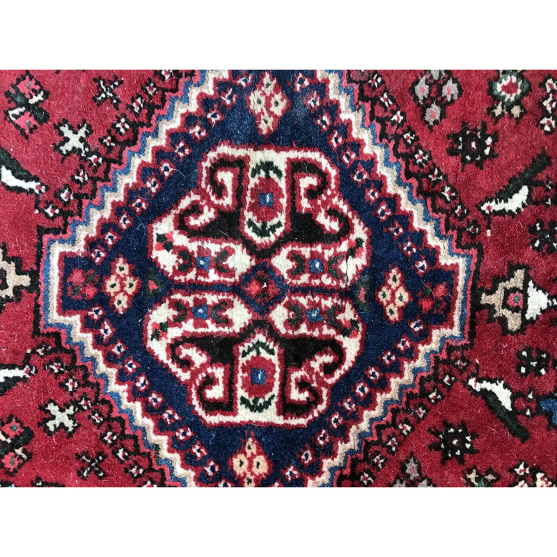 Tapis perse rouge en laine