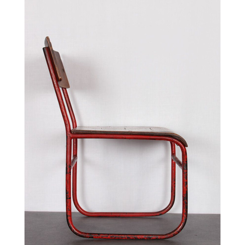 Vintage child chair in tubular metal 1960
