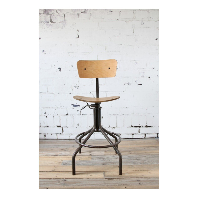 Industrial swiveling chair in metal