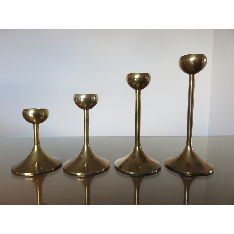 Suite of 4 vintage scandinavian candlesticks in brass 1970