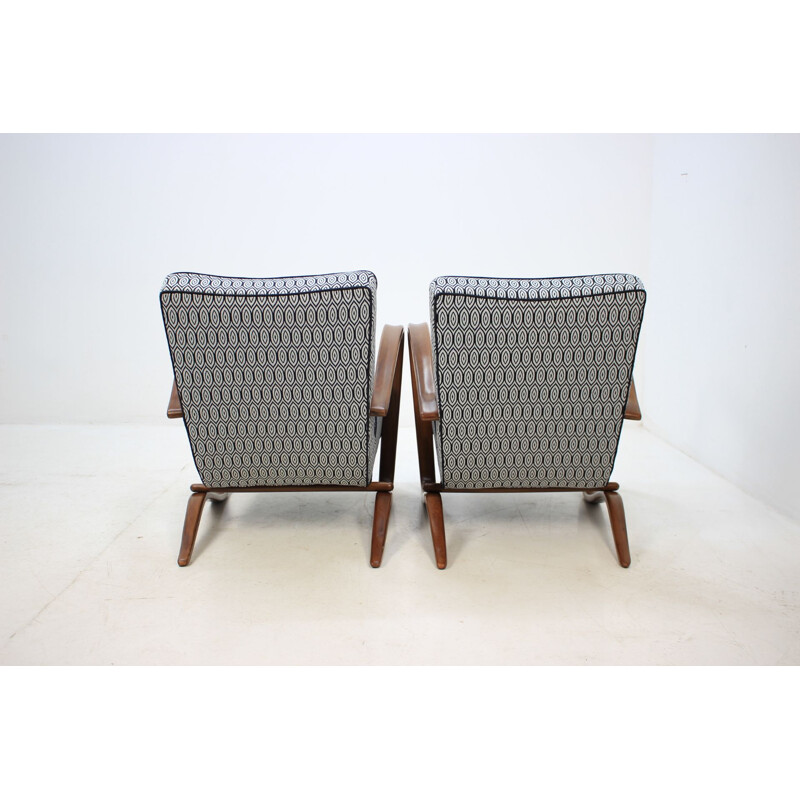 Pair of vintage wooden armchairs by Jindrich Halabala