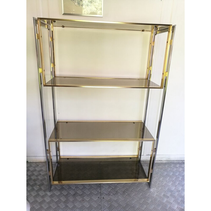 Vintage shelf in golden metal