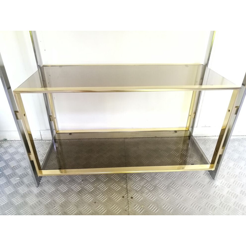 Vintage shelf in golden metal