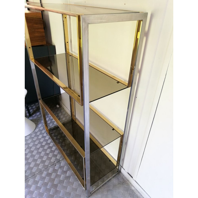 Vintage shelf in golden metal