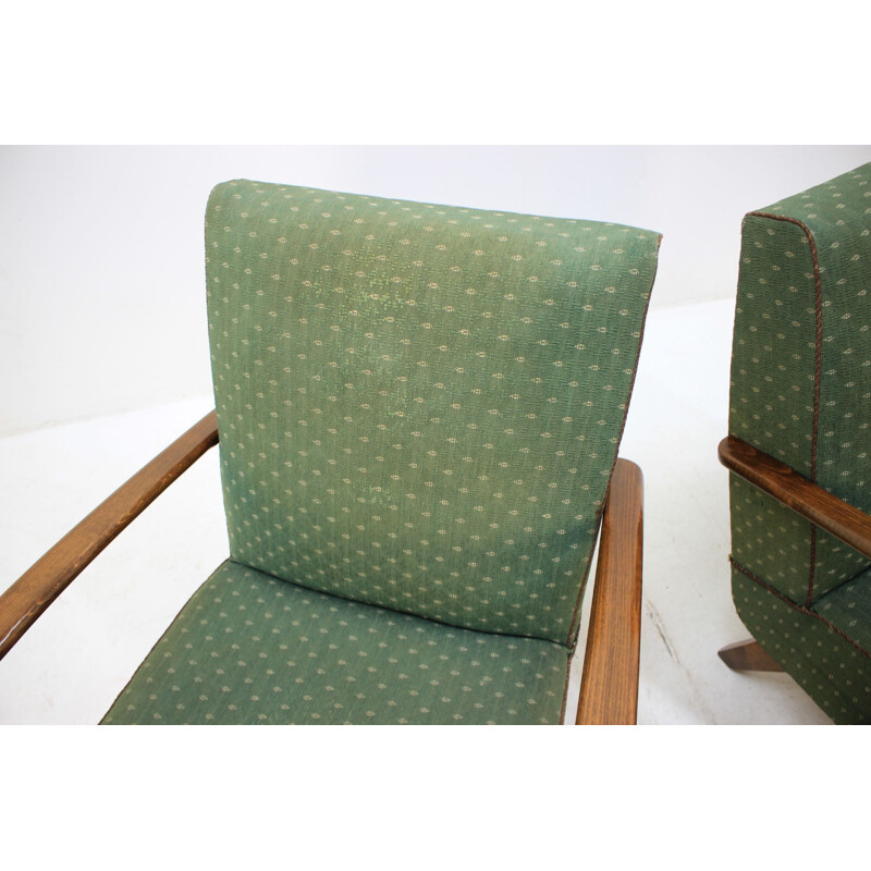 Set of 2 vintage armchairs by Jindřich Halabala in oakwood and green fabric