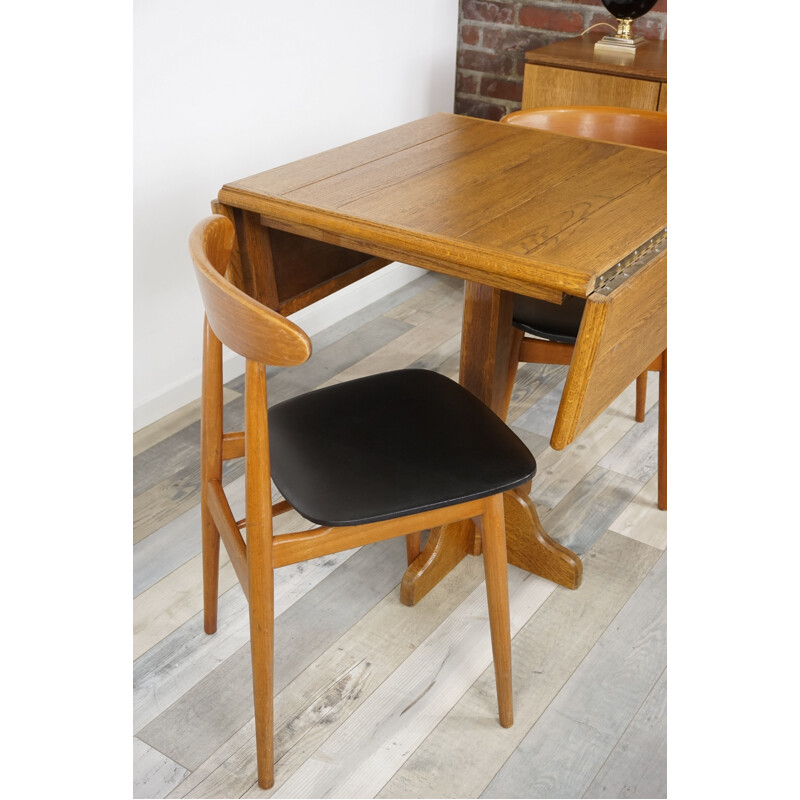 Vintage chair in teak and leather